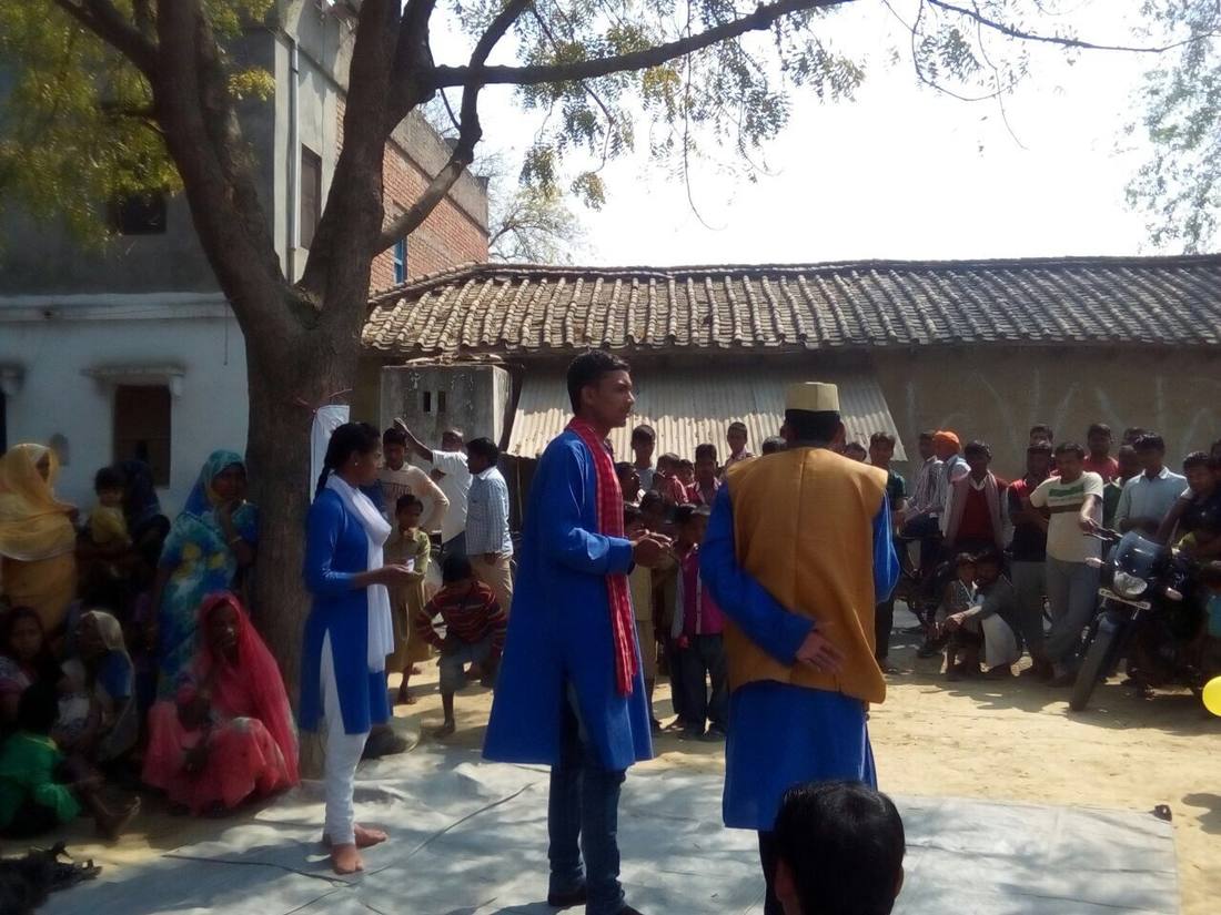 Grassroots IEC community outreach activity in a Bihar village